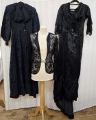 A quantity of black period dresses, some adapted for theatrical use, to include a black lace and net