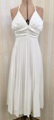 White halterneck party dress labelled Richard Shops size 12, pleated skirt, empire line and ruched