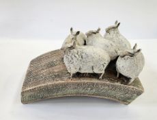 Blandine Anderson stoneware model 'The Ploughed Field' five Border Leicester sheep on arched base,