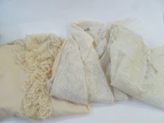 Quantity of late 1960's and 70's white nylon frilled blouses, white, apricot, brown and black