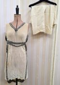 Late 1920's pale chiffon flapper dress with beaded Art Deco-style panel to the front, a beaded
