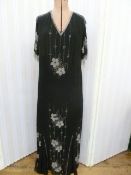 1920'S black chiffon dress, full length, heavily beaded with steel cut beads, flowers and fringes,