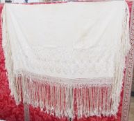 Cream wool Chinese embroidered shawl, embroidered in cream with a deep cream fringe (stained)