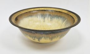 Hazel Johnston (1933-2011) studio pottery bowl, mottled brown and blue on yellow ground with gold