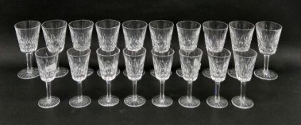 Set of eighteen Waterford Crystal 'Lismore' pattern wine glasses, 14.5cm high and 12.5cm high