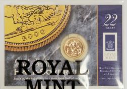 Elizabeth II 2000 gold bullion half sovereign, on original Royal Mint card and packet