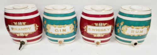 Two pairs of 19th century Staffordshire pottery named spirit barrels and covers, comprising: S.