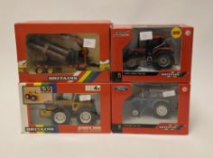 Four boxed 1:32 scale Britains diecast farming vehichles to include 9533 Log Transporter, 9251
