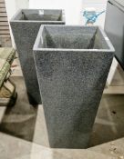 Pair of contemporary granite garden planters of square tapering form, retailed by Iota, 85cm high