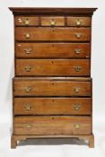 Georgian chest on chest, the moulded pediment above three short and three long drawers on a base