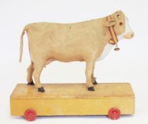 German/Austrian papier-mache pull-along cow (no horns) on wheeled wooden base with mooing