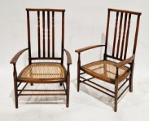 Pair of Arts and Crafts low elbow chairs in the manner of William Morris for Liberty & Co, each with