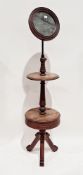 19th century mahogany shaving stand, the adjustable circular mirror above a mid-tier circular
