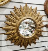 Mid-century gilt effect sunburst convex mirror, 53cm diameter