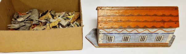 Wooden painted Noah's Ark with a quantity of wooden animals to include Dogs, Cows, Horses, Birds,