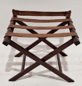 Mahogany folding luggage stand with stitched tan leather supports, on x-frame base, 54cm high x 59cm