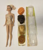 Mattel Barbie Fashion Queen, circa 1962, with moulded hair and blue eyes, in a gold and white