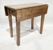 19th century pine drop flap table, the rectangular top with frieze drawer to one end, on square