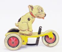 Gunthermann tinplate Bonzo on three wheel scooter, clockwork toy with key marked SG made in