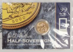 Elizabeth II 2000 gold bullion half sovereign, on original Royal Mint card and packet