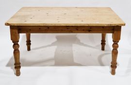 Pine kitchen table, the rectangular top over a single frieze drawer to end, on turned baluster legs,