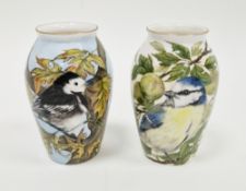 Two limited edition bone china oviform vases painted with birds by Helen Halloran, late 20th