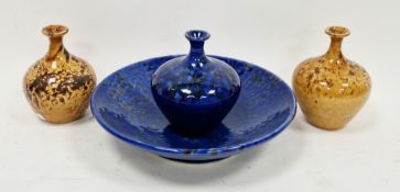 Four pieces of studio pottery by Russell Akerman, to include a pair of vases decorated with oxide