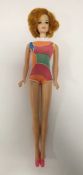 Mattel Barbie Stacey twist 'n' turn doll, circa 1968, with short auburn hair and blue eyes,