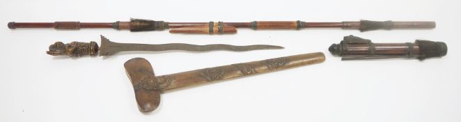 Javanese kris with carved handle, decorative blade and carved scabbard, together with a blowpipe and