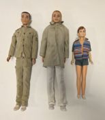 Mattel Barbie Ken doll with blonde flop hair and blue eyes, dressed in a rally outfit, marked Ken