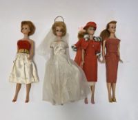 Four Mattel Barbie dolls, circa 1960's, including two bubblecut dolls with blonde hair and auburn