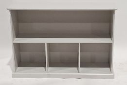 Great Little Trading Co. grey finished low bookcase comprising a shelf with three sectioned