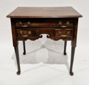 George II oak lowboy or side table, the rectangular top with ogee moulded edge over an arrangement