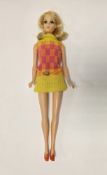 Mattel Barbie walking Jamie doll, circa early 1970's, with blonde hair and brown hairs, wearing a