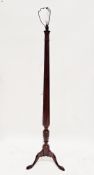Mahogany standard lamp on turned fluted supports, three splayed legs, 161cm high