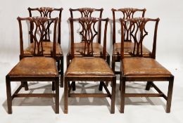 Set of six mahogany dining chairs in the George III manner, having pierced carved splats, brown