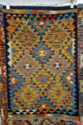 Chobi blue ground kilim with lozenge pattern field, multiple geometric borders  122cm x 82cm