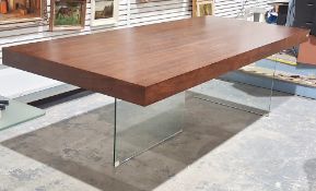 Contemporary floating dining table, possibly by Angel Cerda Ltd, the rectangular hardwood top on two