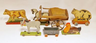 Quantity of vintage pull-along childrens toys to include Horse drawn cart marked tri-ang to cart,