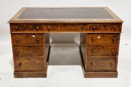 19th century mahogany and walnut twin pedestal desk, the top with burgundy leather effect writing