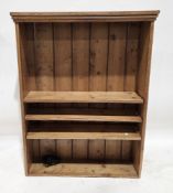 19th century pine bookcase / dresser top, the moulded cornice over three adjustable open shelves,