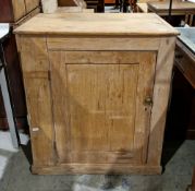 19th century pine cupboard, the single panel door with brass knob handle opening to two shelves,