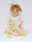 Bruno Schmidt bisque headed doll, no.692 with brown fixed eyes, moulded upper teeth, composition