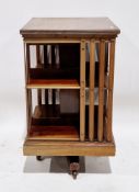 Victorian mahogany library revolving bookcase, of square form with two shelves and partial slatted