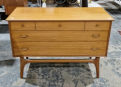Mid century Alfred Cox teak chest of drawers, comprising three short drawers with gilt metal knob