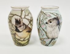 Two limited edition bone china oviform vases painted with birds by Helen Halloran, late 20th