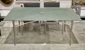 Gaze Burvill garden table, the rectangular frosted glass top on brushed steel tubular legs united by
