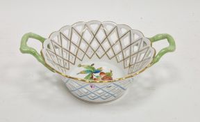Herend porcelain circular two-handled basket, printed and painted with the Queen Victoria pattern,