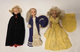 Three Pedigree Sindy dolls, circa 1980's, all with blonde hair and blue eyes, dressed in various