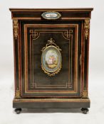 19th century French ebonised and walnut pier cabinet, the frieze and single panel door mounted